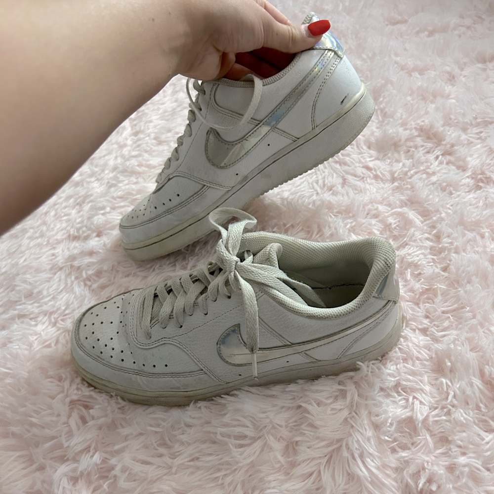Women’s Nike Air Force 1s with silver swoosh